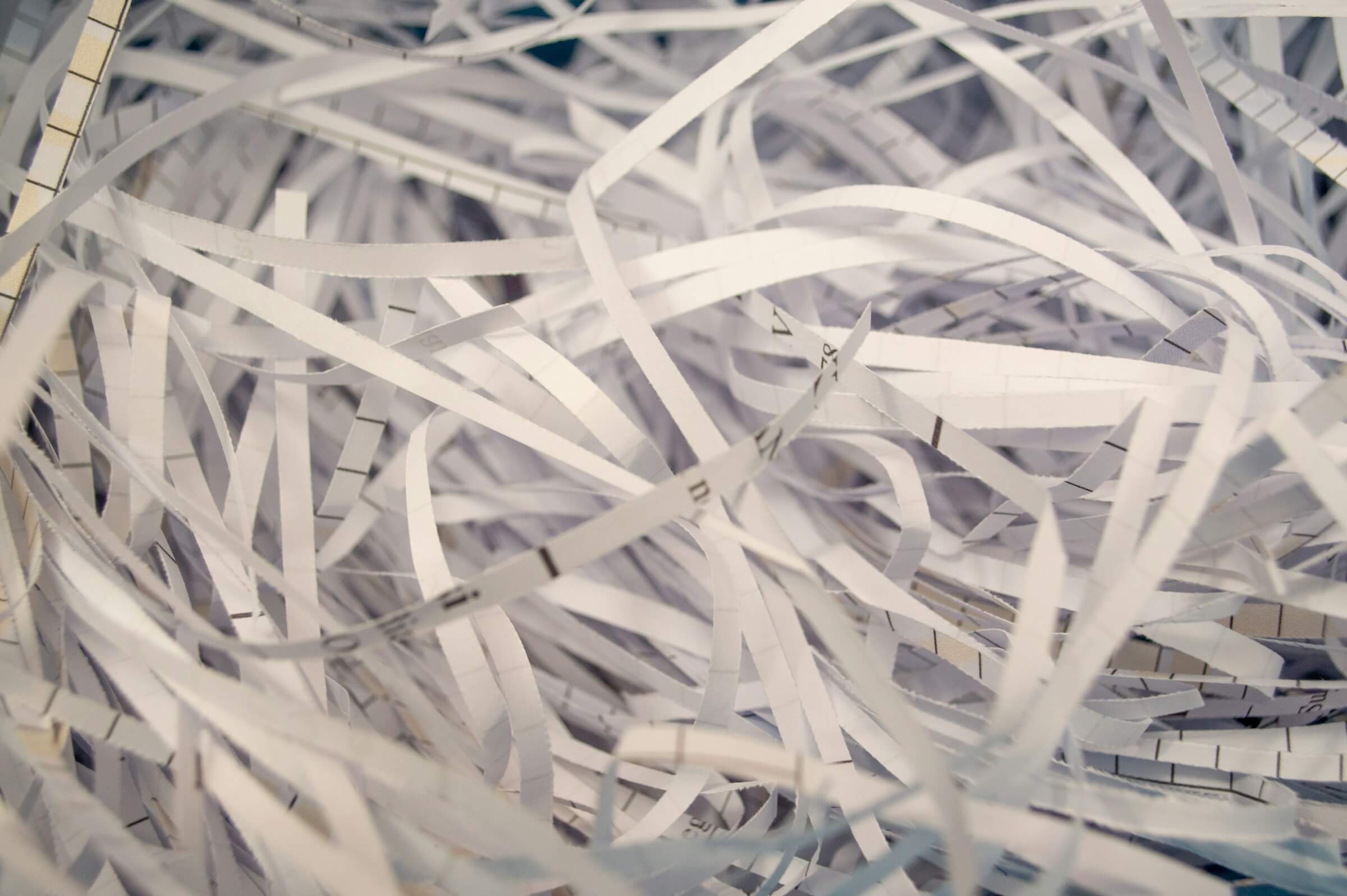close up image of shredded paper to show that someone is protecting their identity.